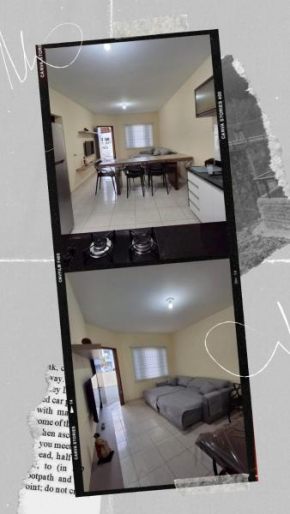 Casa aconchegante, com churrasqueira, garagem e apenas 1 quadra e meia do mar